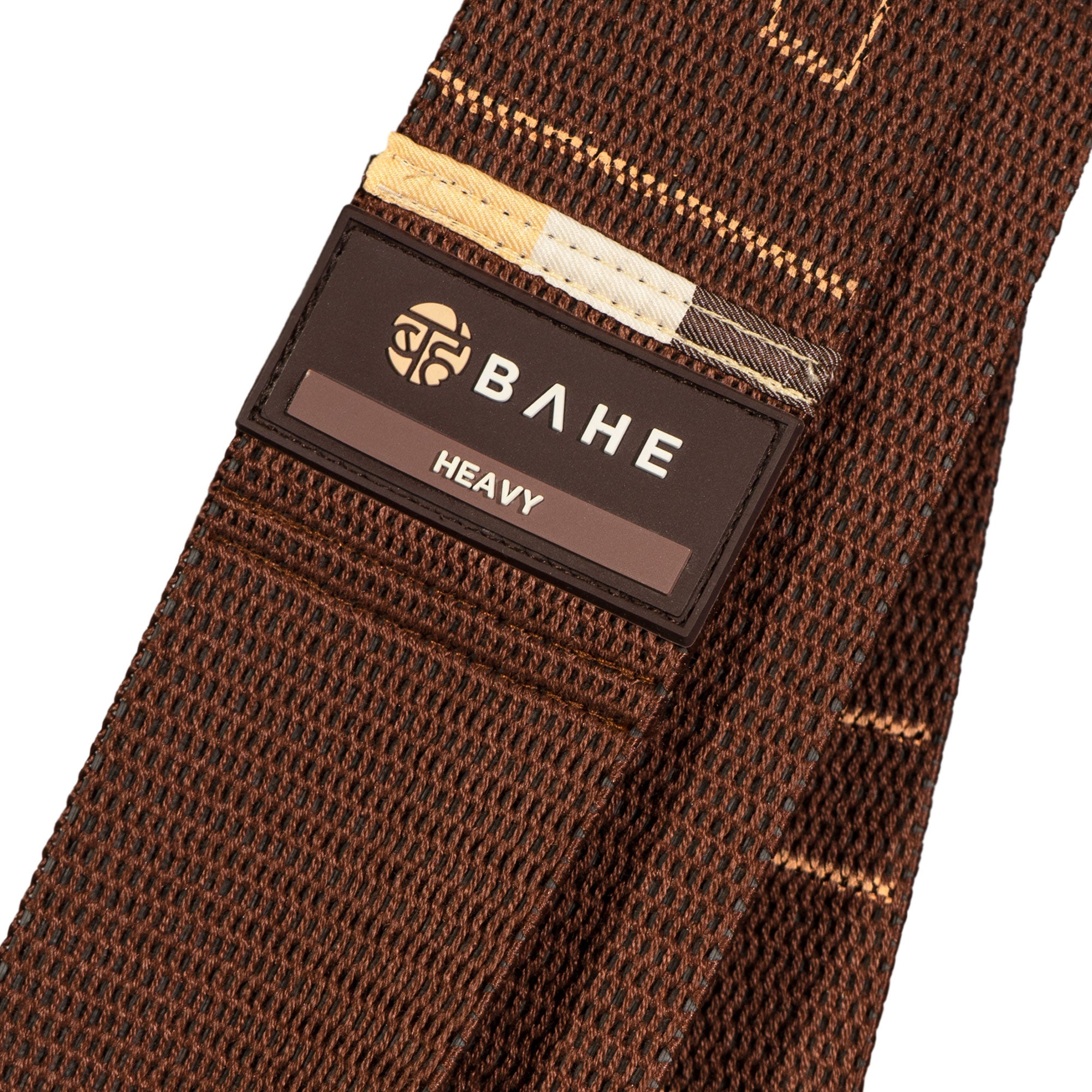 Brown tie with 'BAHE' label on a white background